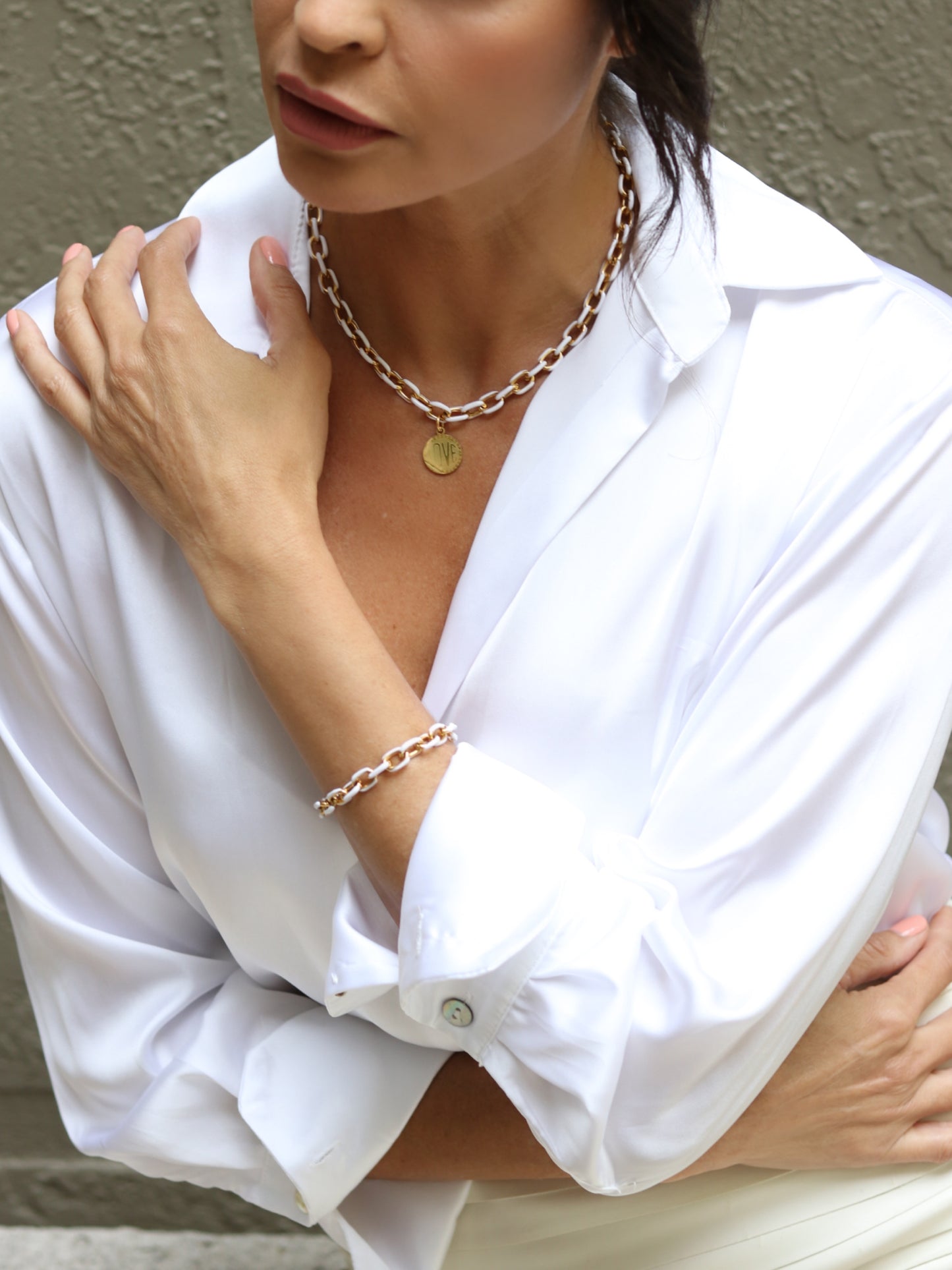 chunky gold chain
classy elegant style
fashion trendy
anniversary wife
birthday gift woman
valentines gift
stylish fashionista
gold statement chain
business attire
classic contemporary
love charm pendant
white enamel chain
gift for mom bday